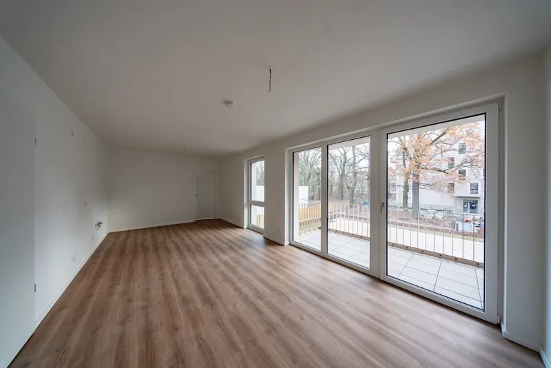 Schicker Neubau in der Waterkant mit Fußbodenheizung im Erstbezug / WBS 220 erforderlich — photo 1